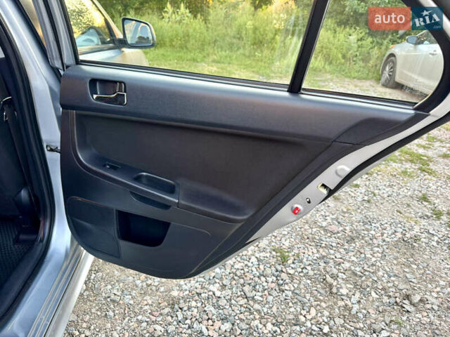 Сірий Міцубісі Lancer, об'ємом двигуна 2 л та пробігом 223 тис. км за 7390 $, фото 16 на Automoto.ua