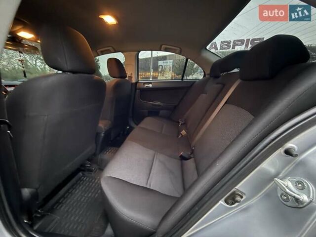 Сірий Міцубісі Lancer, об'ємом двигуна 2 л та пробігом 280 тис. км за 6999 $, фото 12 на Automoto.ua