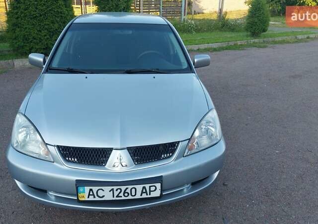 Серый Мицубиси Лансер, объемом двигателя 1.6 л и пробегом 117 тыс. км за 3980 $, фото 1 на Automoto.ua