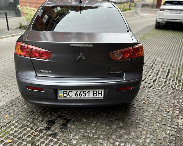 Сірий Міцубісі Lancer, об'ємом двигуна 2 л та пробігом 131 тис. км за 4899 $, фото 4 на Automoto.ua