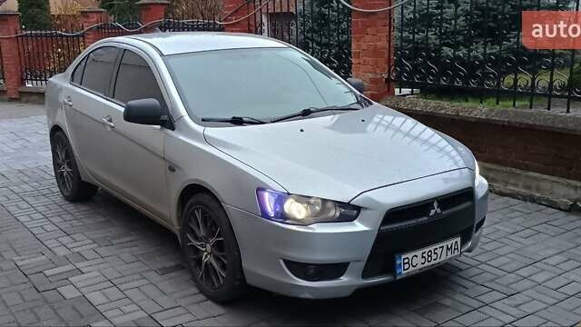 Серый Мицубиси Лансер, объемом двигателя 1.5 л и пробегом 230 тыс. км за 6300 $, фото 1 на Automoto.ua