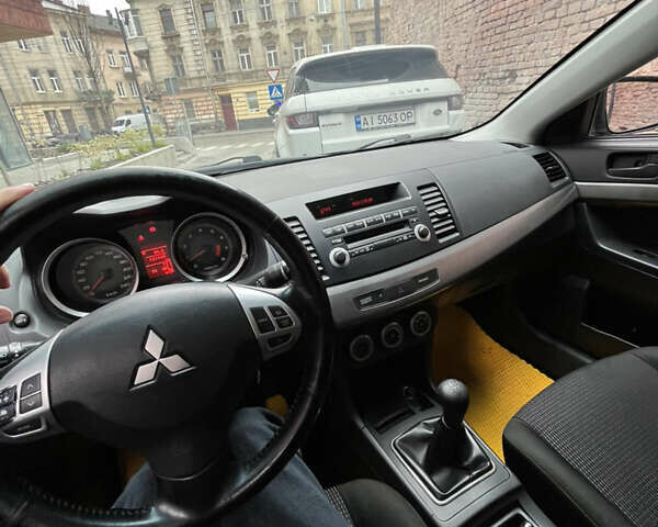 Сірий Міцубісі Lancer, об'ємом двигуна 2 л та пробігом 131 тис. км за 4899 $, фото 8 на Automoto.ua