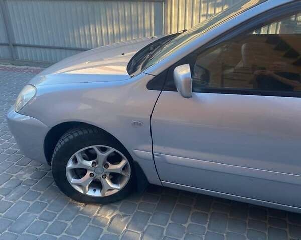 Серый Мицубиси Лансер, объемом двигателя 1.6 л и пробегом 242 тыс. км за 4500 $, фото 7 на Automoto.ua