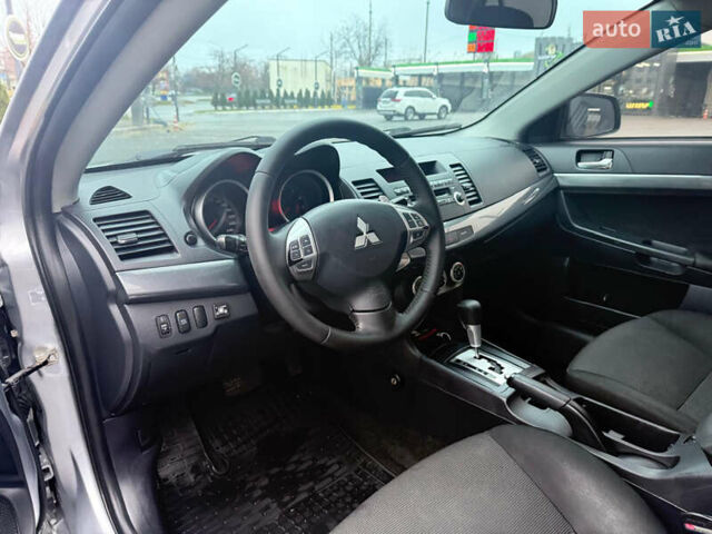 Серый Мицубиси Лансер, объемом двигателя 2 л и пробегом 220 тыс. км за 6500 $, фото 6 на Automoto.ua