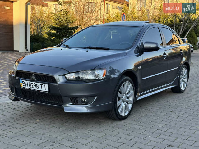 Сірий Міцубісі Lancer, об'ємом двигуна 2 л та пробігом 92 тис. км за 9800 $, фото 34 на Automoto.ua
