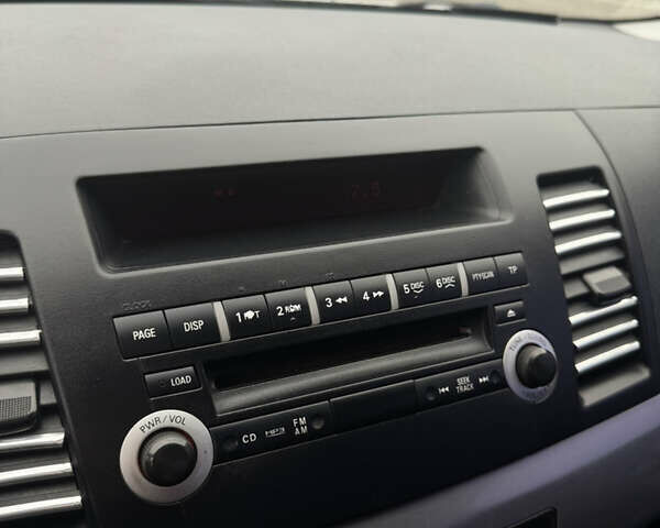 Сірий Міцубісі Lancer, об'ємом двигуна 2 л та пробігом 185 тис. км за 7000 $, фото 17 на Automoto.ua