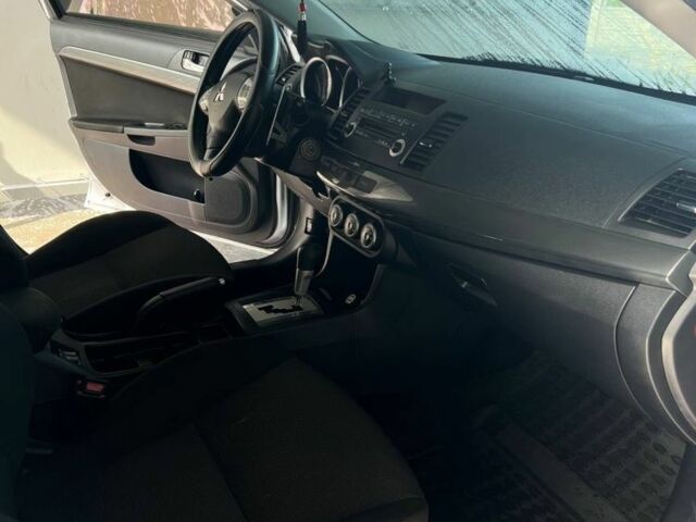 Сірий Міцубісі Lancer, об'ємом двигуна 2 л та пробігом 238 тис. км за 6400 $, фото 15 на Automoto.ua