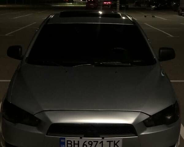 Серый Мицубиси Лансер, объемом двигателя 2 л и пробегом 225 тыс. км за 8200 $, фото 2 на Automoto.ua