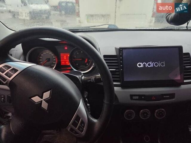 Серый Мицубиси Лансер, объемом двигателя 2 л и пробегом 175 тыс. км за 6500 $, фото 1 на Automoto.ua