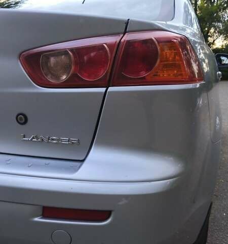 Міцубісі Lancer 2008 у Києві на Automoto.ua Сірий Міцубісі Lancer, об'ємом двигуна 2 л та пробігом 175 тис. км за 8200 $, фото 2 на Automoto.ua