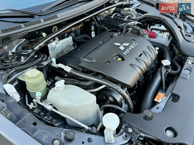 Сірий Міцубісі Lancer, об'ємом двигуна 2 л та пробігом 92 тис. км за 9800 $, фото 94 на Automoto.ua