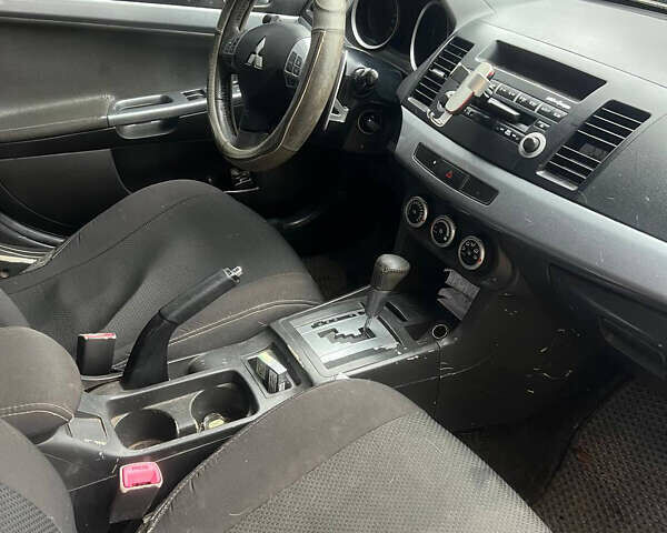 Сірий Міцубісі Lancer, об'ємом двигуна 2 л та пробігом 480 тис. км за 4000 $, фото 4 на Automoto.ua