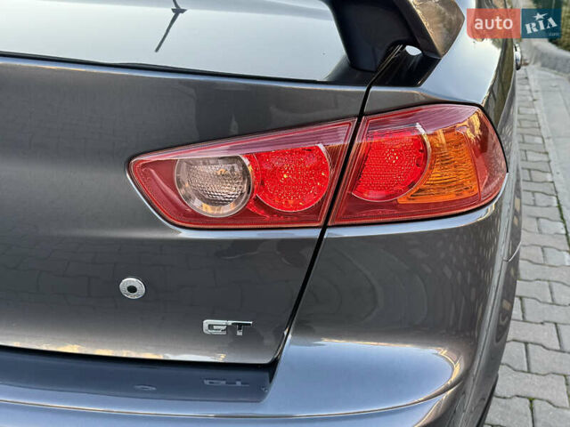 Сірий Міцубісі Lancer, об'ємом двигуна 2 л та пробігом 92 тис. км за 9800 $, фото 20 на Automoto.ua