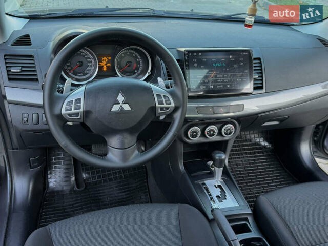 Сірий Міцубісі Lancer, об'ємом двигуна 2 л та пробігом 92 тис. км за 9800 $, фото 83 на Automoto.ua