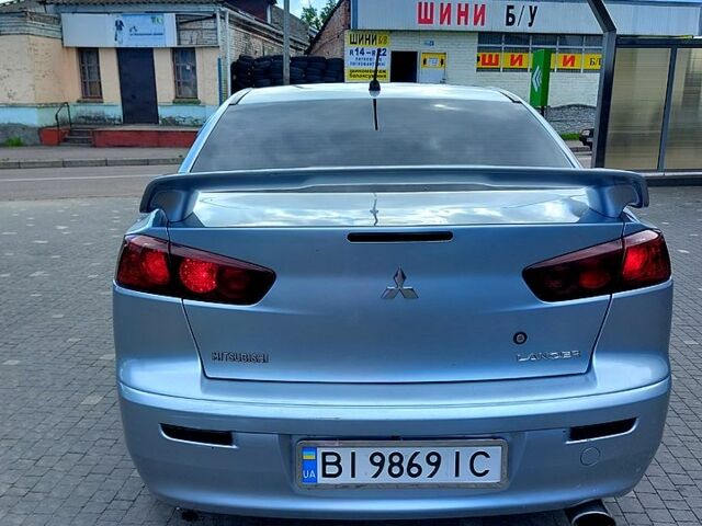 Серый Мицубиси Лансер, объемом двигателя 2 л и пробегом 265 тыс. км за 6800 $, фото 4 на Automoto.ua