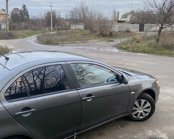 Серый Мицубиси Лансер, объемом двигателя 1.5 л и пробегом 255 тыс. км за 6500 $, фото 17 на Automoto.ua