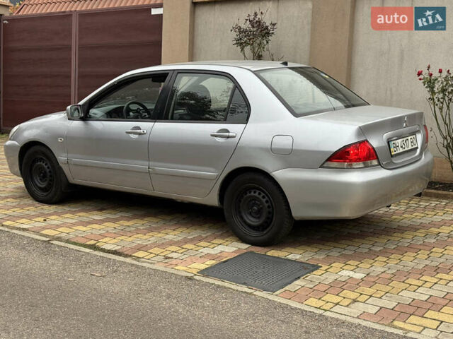 Сірий Міцубісі Lancer, об'ємом двигуна 1.6 л та пробігом 221 тис. км за 3650 $, фото 15 на Automoto.ua