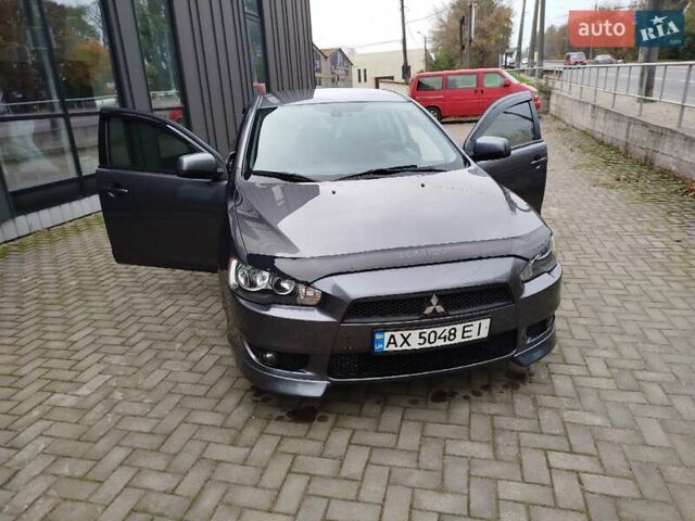Міцубісі Lancer 2008 у Хмельницькому на Automoto.ua Сірий Міцубісі Lancer, об'ємом двигуна 2 л та пробігом 157 тис. км за 6300 $, фото 26 на Automoto.ua