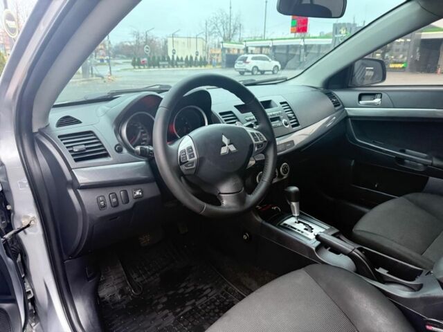 Серый Мицубиси Лансер, объемом двигателя 2 л и пробегом 210 тыс. км за 6500 $, фото 4 на Automoto.ua