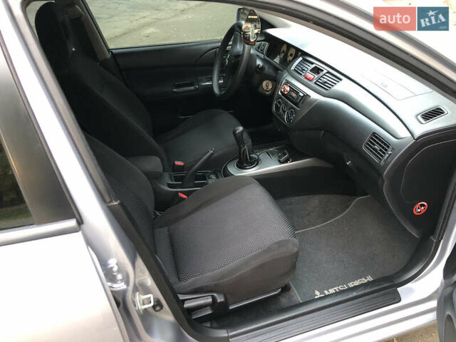 Мицубиси Лансер 2008 в Николаеве на Automoto.ua Серый Мицубиси Лансер, объемом двигателя 1.58 л и пробегом 132 тыс. км за 5900 $, фото 9 на Automoto.ua