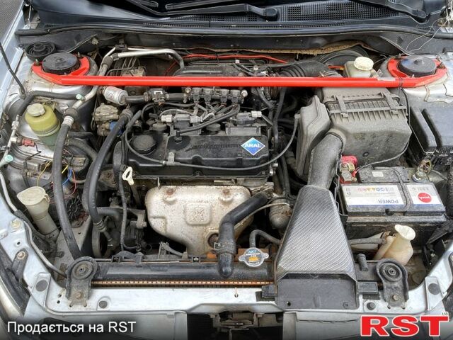 Сірий Міцубісі Lancer, об'ємом двигуна 1.6 л та пробігом 193 тис. км за 4500 $, фото 12 на Automoto.ua