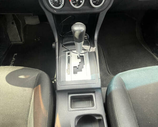 Серый Мицубиси Лансер, объемом двигателя 2 л и пробегом 265 тыс. км за 5500 $, фото 7 на Automoto.ua