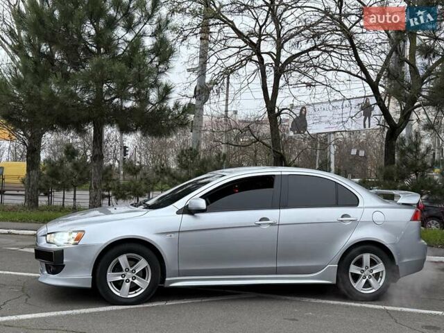 Сірий Міцубісі Lancer, об'ємом двигуна 2 л та пробігом 280 тис. км за 6999 $, фото 4 на Automoto.ua