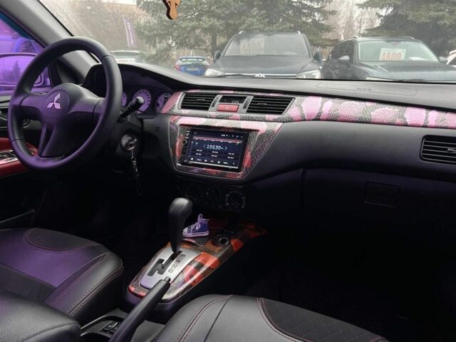 Серый Мицубиси Лансер, объемом двигателя 1.6 л и пробегом 205 тыс. км за 5400 $, фото 12 на Automoto.ua