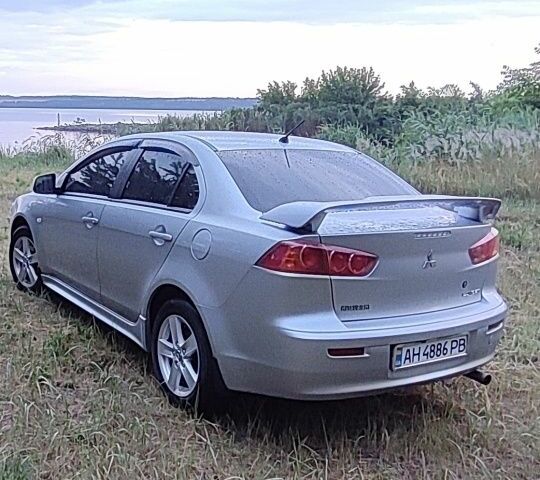 Сірий Міцубісі Lancer, об'ємом двигуна 2 л та пробігом 138 тис. км за 6999 $, фото 2 на Automoto.ua
