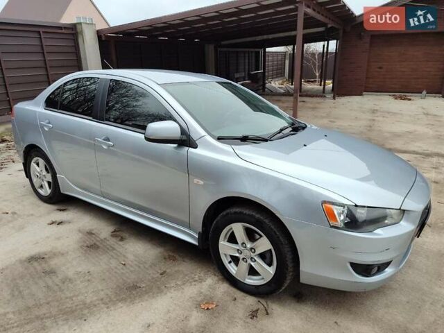 Серый Мицубиси Лансер, объемом двигателя 2 л и пробегом 234 тыс. км за 7200 $, фото 8 на Automoto.ua