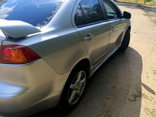 Сірий Міцубісі Lancer, об'ємом двигуна 1.5 л та пробігом 177 тис. км за 5700 $, фото 9 на Automoto.ua