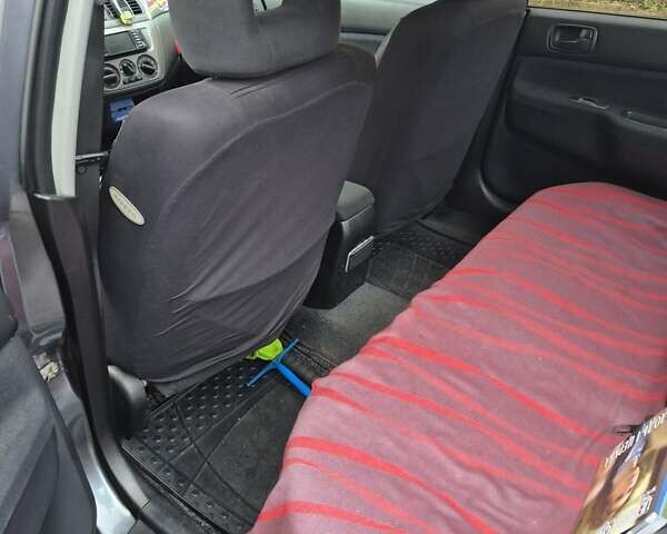 Сірий Міцубісі Lancer, об'ємом двигуна 1.6 л та пробігом 230 тис. км за 4400 $, фото 7 на Automoto.ua