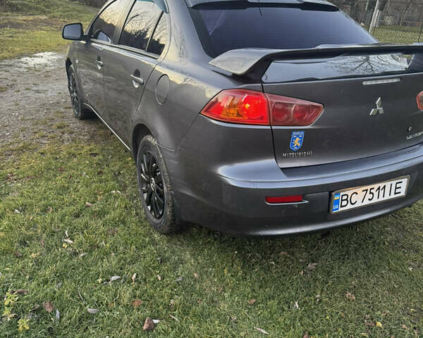 Сірий Міцубісі Lancer, об'ємом двигуна 1.5 л та пробігом 239 тис. км за 4900 $, фото 4 на Automoto.ua