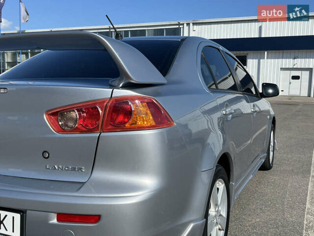 Сірий Міцубісі Lancer, об'ємом двигуна 2 л та пробігом 237 тис. км за 7200 $, фото 22 на Automoto.ua