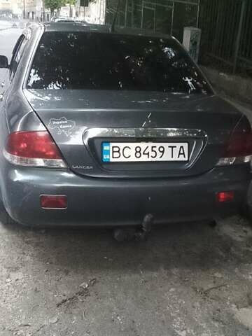 Сірий Міцубісі Lancer, об'ємом двигуна 1.58 л та пробігом 323 тис. км за 3300 $, фото 5 на Automoto.ua
