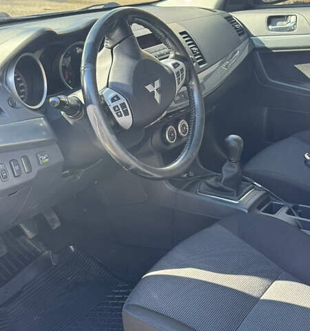 Серый Мицубиси Лансер, объемом двигателя 2 л и пробегом 190 тыс. км за 6900 $, фото 11 на Automoto.ua