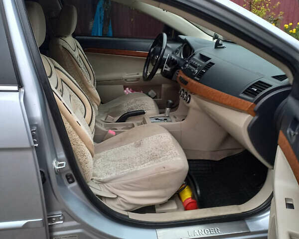 Сірий Міцубісі Lancer, об'ємом двигуна 2 л та пробігом 180 тис. км за 6400 $, фото 6 на Automoto.ua