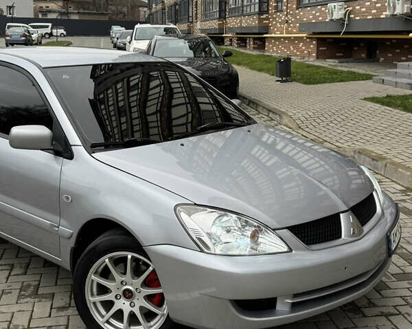 Сірий Міцубісі Lancer, об'ємом двигуна 1.6 л та пробігом 269 тис. км за 3999 $, фото 3 на Automoto.ua