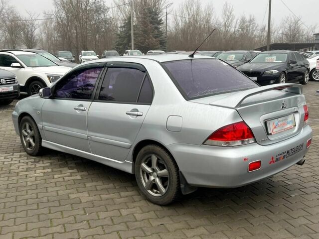 Серый Мицубиси Лансер, объемом двигателя 1.6 л и пробегом 205 тыс. км за 5400 $, фото 4 на Automoto.ua