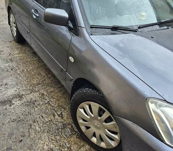 Сірий Міцубісі Lancer, об'ємом двигуна 1.6 л та пробігом 230 тис. км за 4400 $, фото 5 на Automoto.ua
