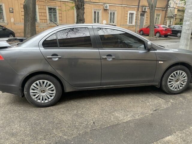 Серый Мицубиси Лансер, объемом двигателя 1.5 л и пробегом 195 тыс. км за 6100 $, фото 5 на Automoto.ua