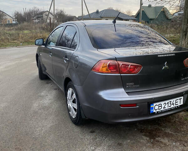 Серый Мицубиси Лансер, объемом двигателя 1.5 л и пробегом 255 тыс. км за 6500 $, фото 8 на Automoto.ua