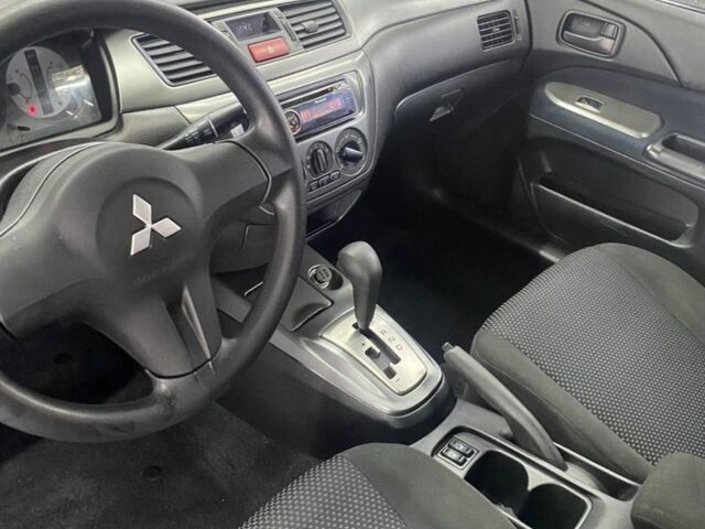 Серый Мицубиси Лансер, объемом двигателя 1.6 л и пробегом 100 тыс. км за 2500 $, фото 13 на Automoto.ua