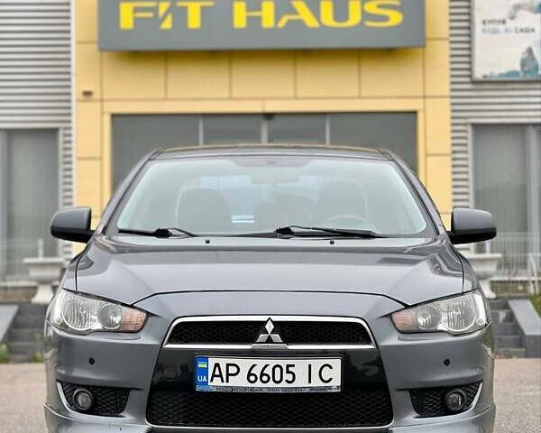 Серый Мицубиси Лансер, объемом двигателя 2 л и пробегом 203 тыс. км за 4999 $, фото 7 на Automoto.ua