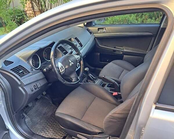 Сірий Міцубісі Lancer, об'ємом двигуна 2 л та пробігом 207 тис. км за 6550 $, фото 7 на Automoto.ua