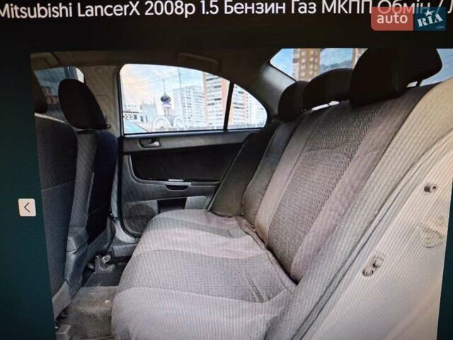 Сірий Міцубісі Lancer, об'ємом двигуна 1.5 л та пробігом 235 тис. км за 6500 $, фото 19 на Automoto.ua