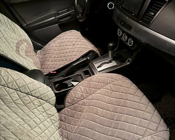 Серый Мицубиси Лансер, объемом двигателя 1.5 л и пробегом 306 тыс. км за 5750 $, фото 7 на Automoto.ua