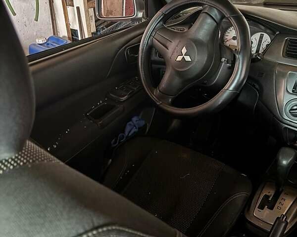 Мицубиси Лансер 2008 в Кропивницком (Кировограде) на Automoto.ua Серый Мицубиси Лансер, объемом двигателя 1.58 л и пробегом 175 тыс. км за 2000 $, фото 1 на Automoto.ua