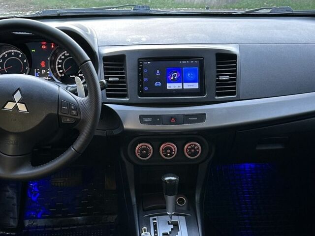 Серый Мицубиси Лансер, объемом двигателя 2 л и пробегом 153 тыс. км за 7500 $, фото 3 на Automoto.ua