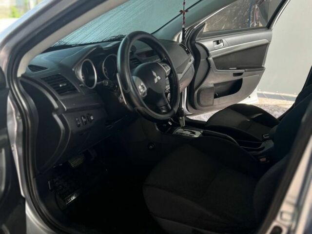 Сірий Міцубісі Lancer, об'ємом двигуна 2 л та пробігом 238 тис. км за 6400 $, фото 12 на Automoto.ua
